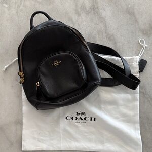 Coach Black Pebbled Leather Backpack with Gold Accents